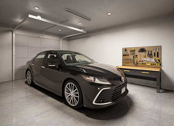 a black car parked in a garage next to a machineat Allier Gulf Shores, Gulf Shores Alabama