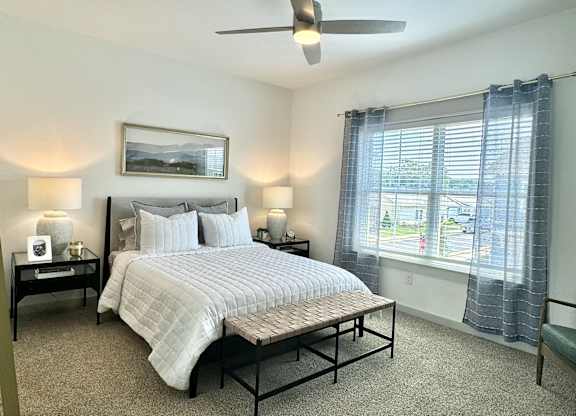 A bedroom with a large bed and a ceiling fan at Allier Foley, Foley, AL 36535