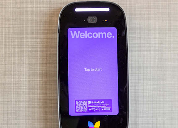 A smartphone with a welcome screen displayed.