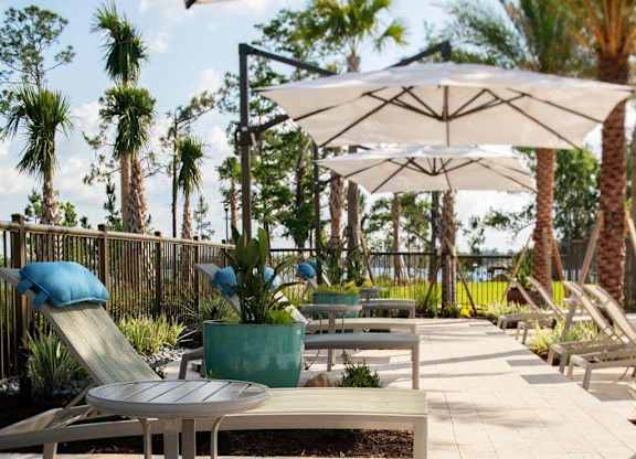 Lounge chairs with umbrellas