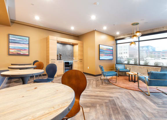 the reserve at bucklin hill clubhouse with tables and chairs