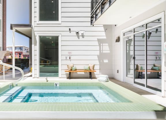 a house with a swimming pool in the backyard