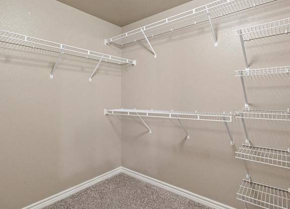 closet at Creed Canyon Apartments in Sherman TX