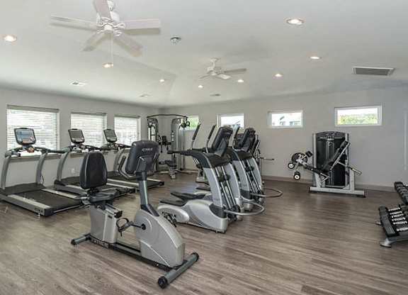 fitness center with cardio equipment