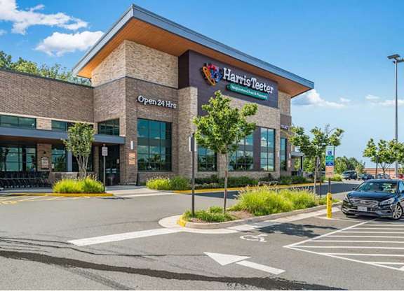 a health care center with a car parked in front of it