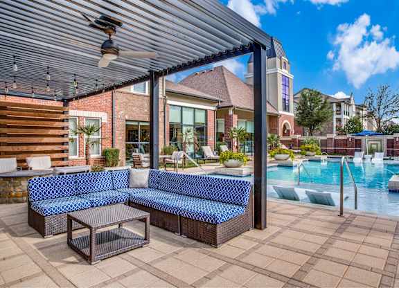 Resort style pool with lounge seating
