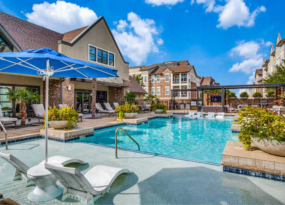 Resort style pool with lounge seating