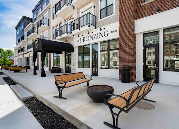 A street view of a building with a sign that says