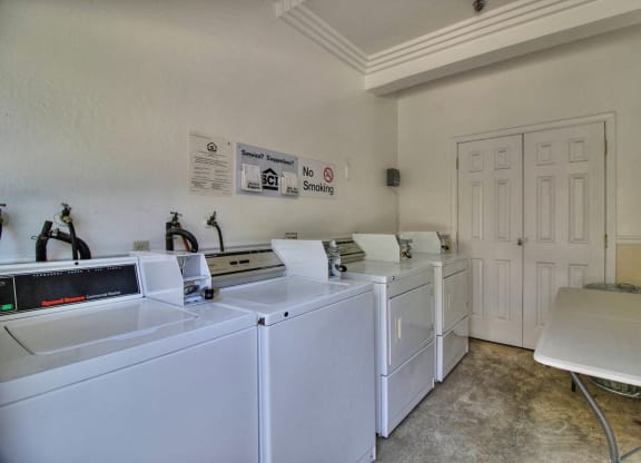 the laundry room is equipped with washes and dryers