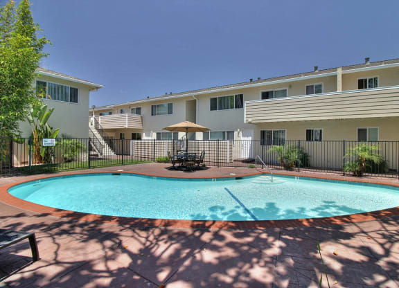 our apartments have a large pool and a patio