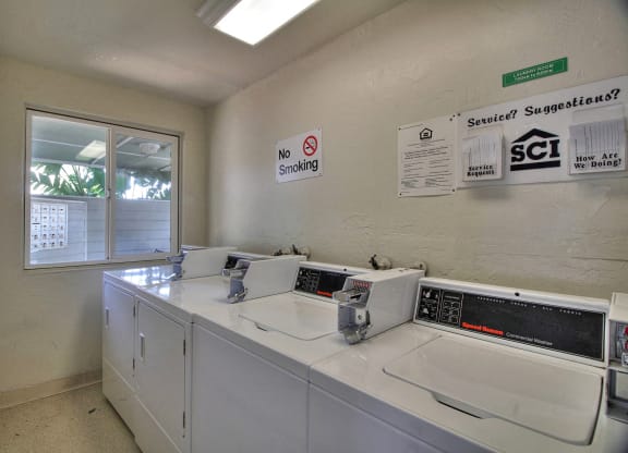 A laundromat with a no smoking sign.