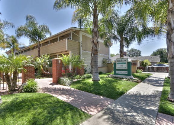 an angled view of the front entrance of the apartment building