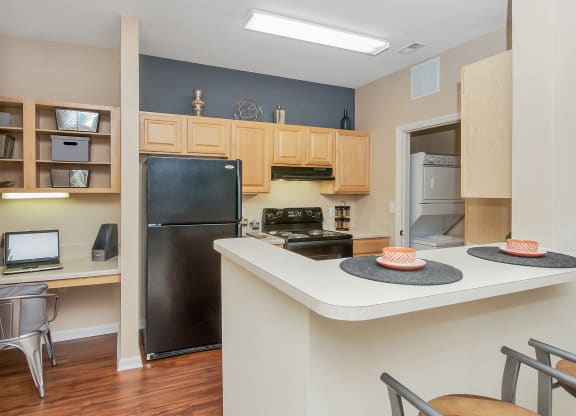 Model In-Kitchen Seating Area at Ultris Courthouse Square Apartment Homes in Stafford, Virginia, VA