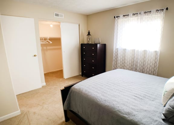 Bedroom with window at Oakwood Apartments, Florence, KY