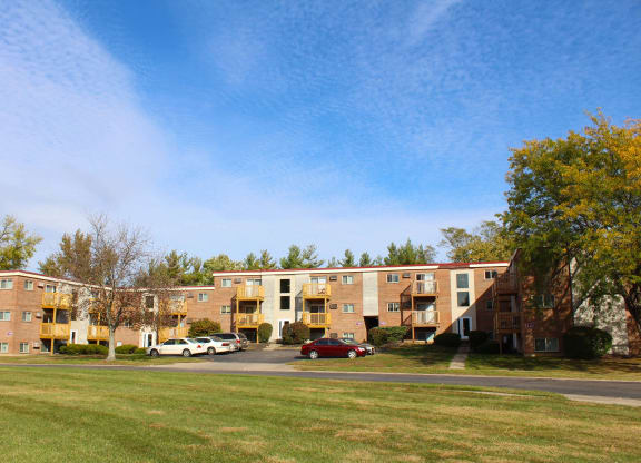 a row of brick apartment buildings on the side of a street  at Wentworth Estates Apartments, Kentucky
