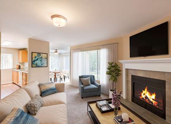 Living Room with fire on in the fireplace at Island Homestead