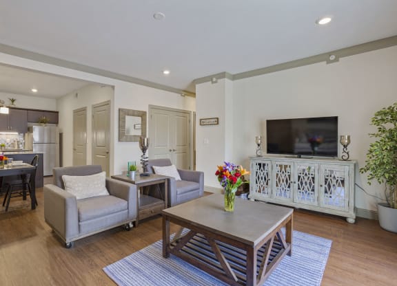 a living room with couches and a table