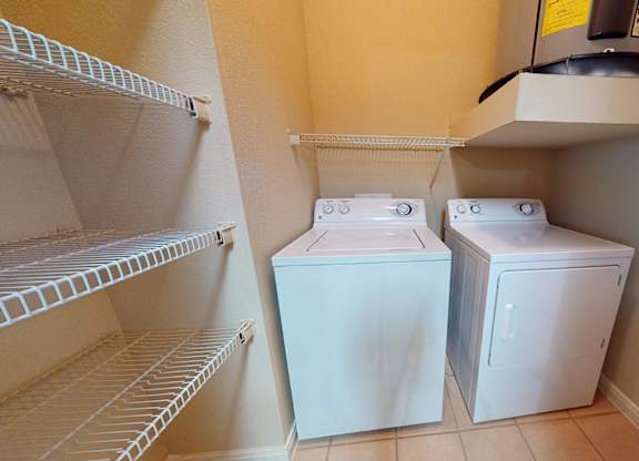 In unit washer dryer at Lakeland Estates Apartments in Stafford TX