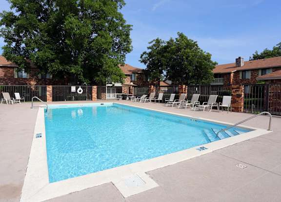 our apartments have a swimming pool with chairs