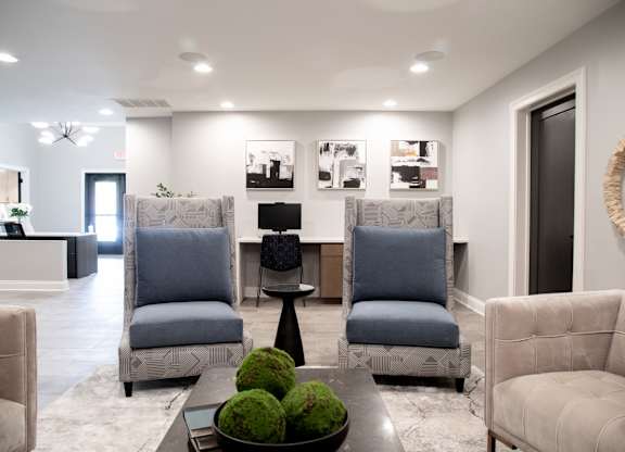 Resident seating in clubhouse at Governor Square Apartments, Carmel, IN