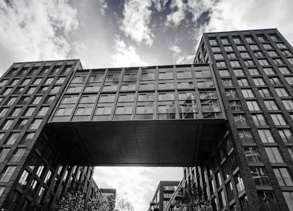 a black and white photo of a tall building