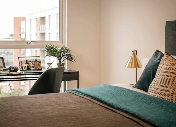 A bedroom with a bed, desk, and chair. at Cherrywood Apartments, D18 VY3V, DUBLIN 18