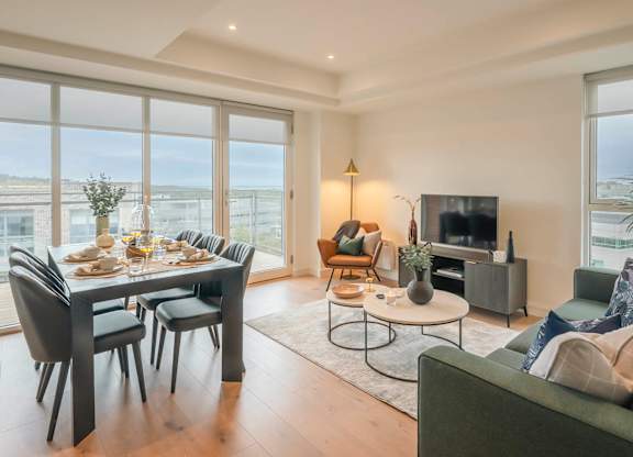 A modern living room with a dining table and a couch at Cherrywood Apartments, D18 VY3V, DUBLIN 18