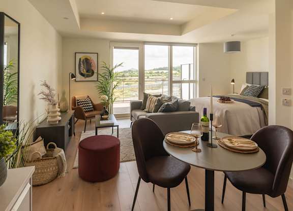 A modern dining room with a round table and chairs at Cherrywood Apartments, D18 VY3V, DUBLIN 18