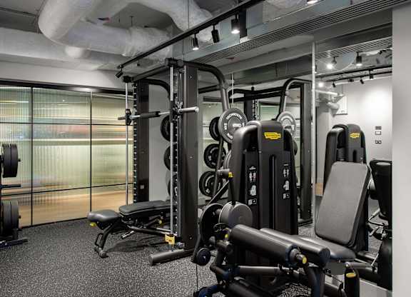Gym with a variety of equipment at The Lark, London
