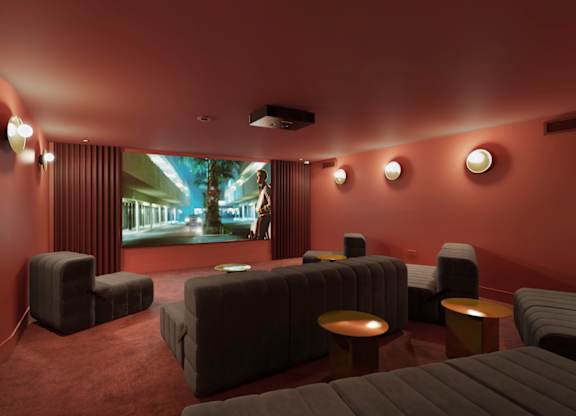 Cinema room with red interior at The Lark, London, SW11 7EA