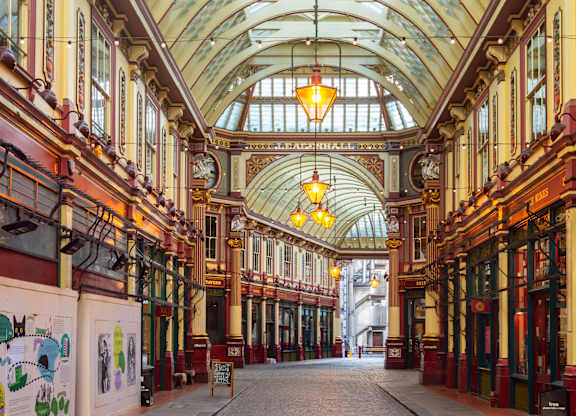 A long hallway with a glass ceiling and a sign that says "FINISH".