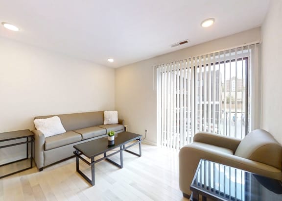 a living room with a couch and a table