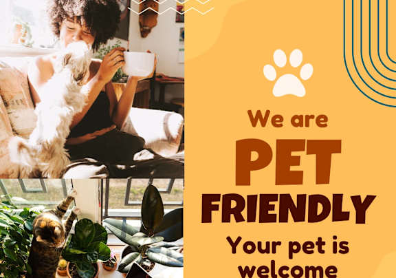 A poster with a woman and a dog, and the text "We are PET FRIENDLY Your pet is welcome".