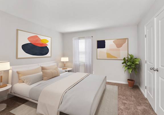 A bedroom with a large bed and a painting on the wall.