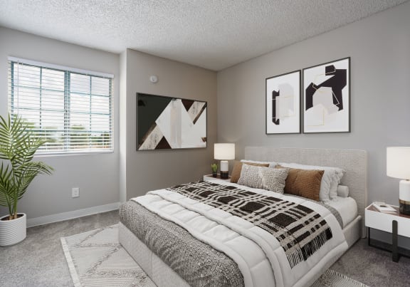 our apartments offer a bedroom with a bed and a window