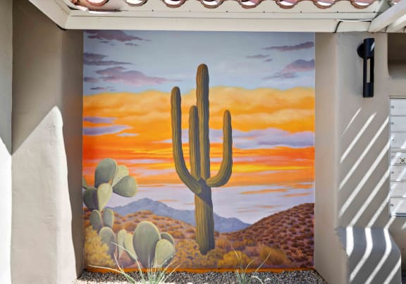 a painting of a saguaro cactus in the desert