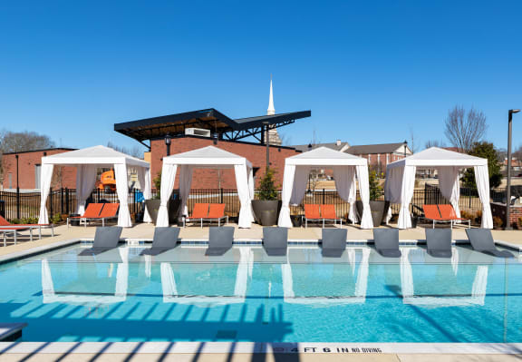 a look at the pool area at the oxford at the boulevard apartments in corinth at The Flats at Southlawn Apartments, Georgia, 30046