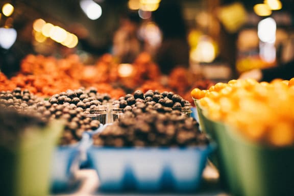 a selection of olives at a market