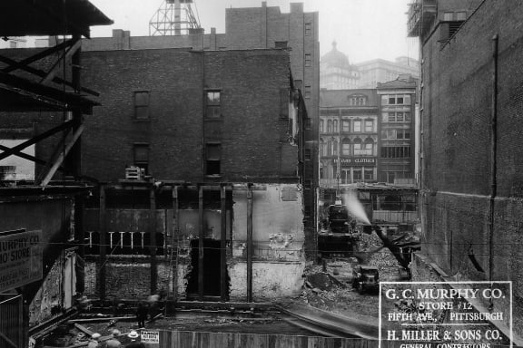 an old black and white photo of a city street with buildings at Market Square Place, Pittsburgh, PA, 15222