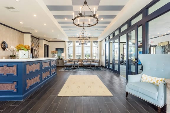 A spacious community room with a blue and white color scheme. at Overland Park, Ohio, 43147