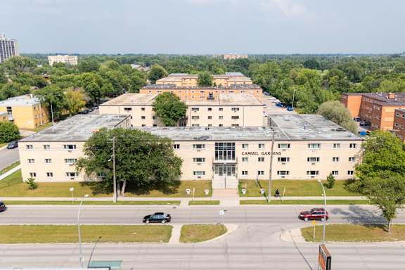 A large building with the words "Campbell Gardens" on the front.