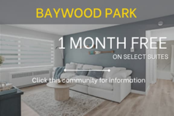 A room with a couch and a sign that says Baywood Park.