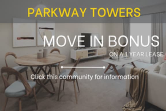 A room with a table and chairs is shown with text advertising a move in bonus on a 1 year lease for Parkway Towers.
