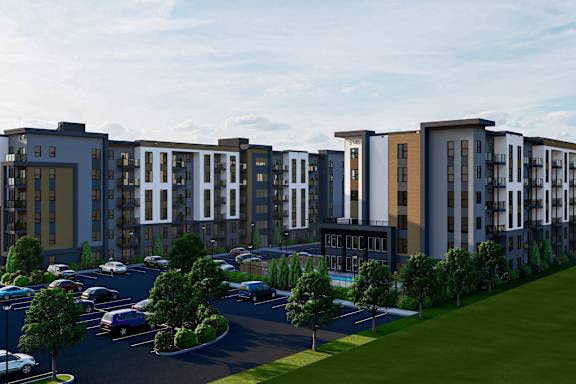 Contemporary apartment complex with parking lot at Mac and Mullen Apartments, Alberta