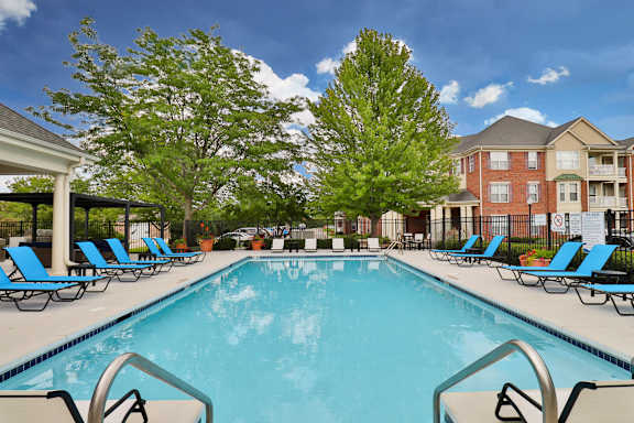 our apartments have a swimming pool with chairs