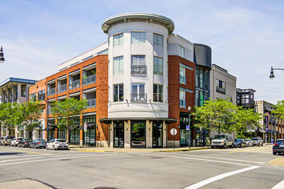 a building on a city street with a sky background at Flats at Southside, Pittsburgh, 15203