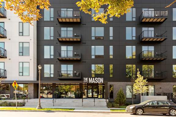 front view of the condominiums on a city street