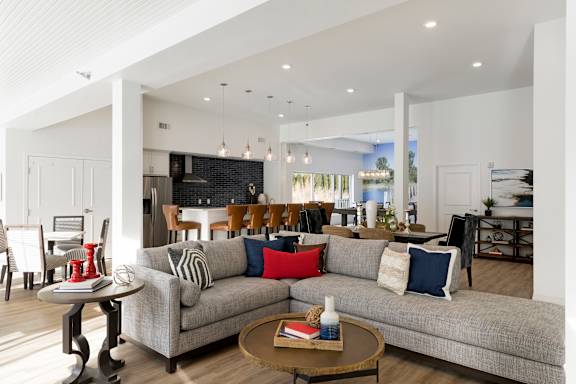 a living room with a couch and a table