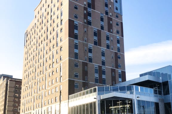 a tall building with a street in front of it