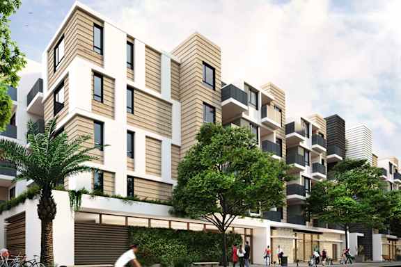 A modern building with a lot of windows and balconies.